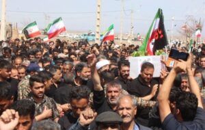 پیکر مطهر  شهید علی اکبر خوافی در میان جلگه آرام گرفت